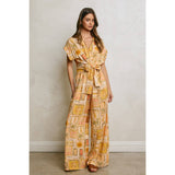 Conversational Surplice Waist Tie Jumpsuit