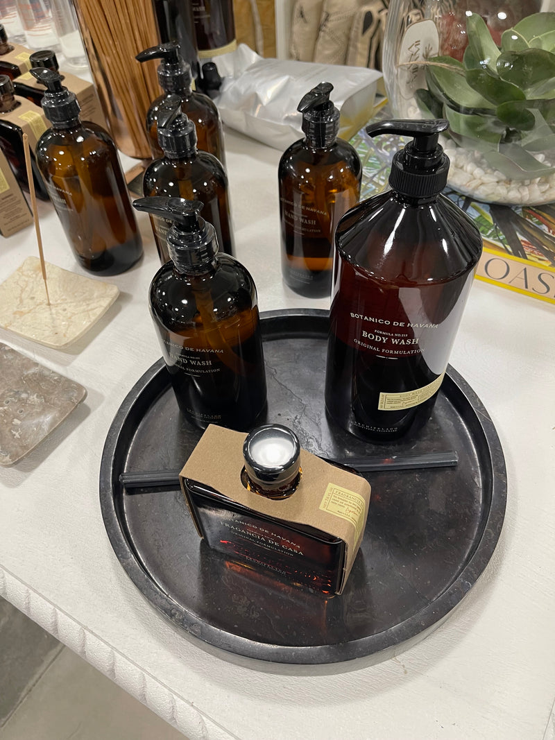 black onyx tray with room scents and body wash