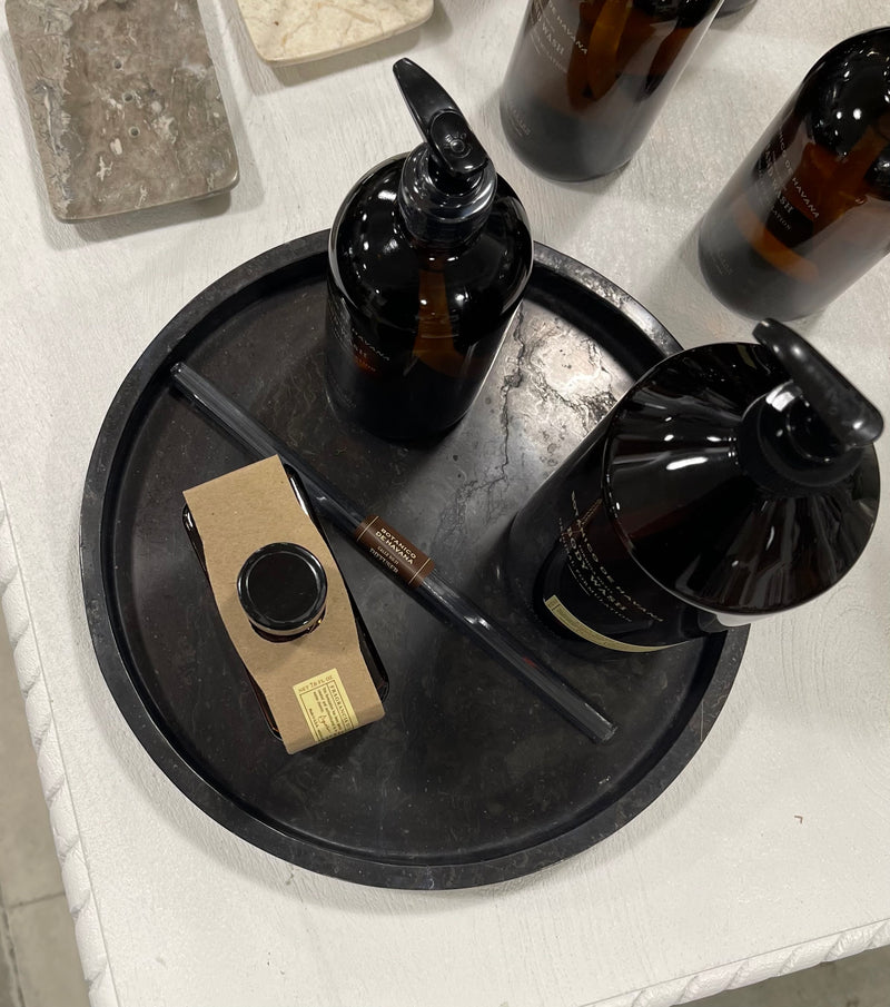 black onyx tray with lotion and soap